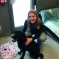 Kim with a Black Labrador Retriever in a 'pet-friendly' house.